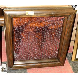 WOOD FRAMED AMBER GLASS WALL HANGING.