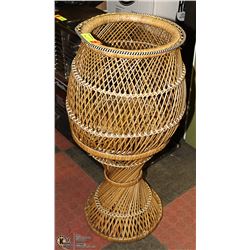 WICKER PLANTER STAND.