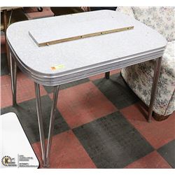 VINTAGE CHROME AND ARBORITE TABLE WITH LEAF.