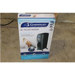 NEW OIL FILLED HEATER IN ORIGINAL BOX