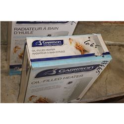 NEW OIL FILLED HEATER IN ORIGINAL BOX