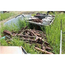 PILE OF SCRAP STEEL, TIRE RIMS, ETC