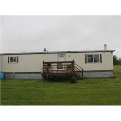 REAL ESTATE:  70 PLUS ACRES OF FENCED HAY AND PASTURE & 14' X 70' MOBILE HOME