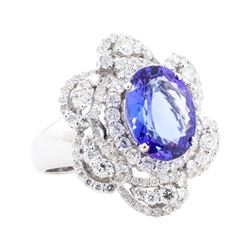 7.28 ctw Tanzanite And Diamond Ring - 18KT White Gold