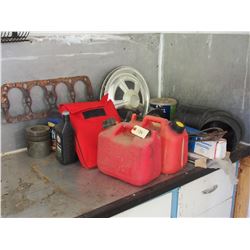 Hubcaps, 2 Gas Cans and Misc