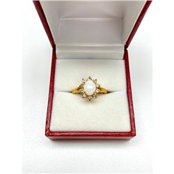 Ladies .35ct Oval Cut White Opal set in 18K Gold Plated Ring