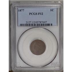 1877 1C Fine 12 PCGS. Moderate to heavy wear over the 