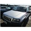 Image 2 : JEEP GR CHEROKEE 2004 SALV T/DONATION