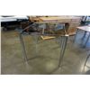 Image 2 : MODERN CHROME AND GLASS TABLE