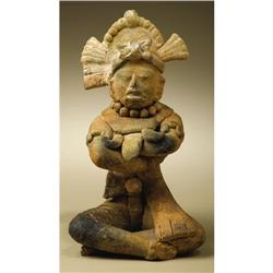 Male Figure Seated Cross-legged with Folded Arms 