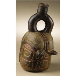 Chavinoid Stirrup Spout Vessel: Head Mythical B 
