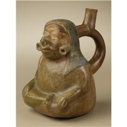 Moche Stirrup-spout Ceramic Vessel: Seated Figu 