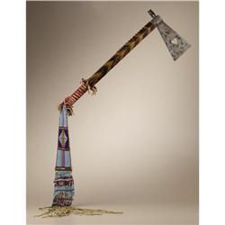 Crow Tomahawk with heart cutout and long beaded 