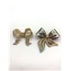 Image 1 : 2 BOW SHAPED BROOCHES LARGE