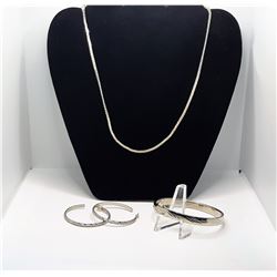 23)  OVAL HINGED SILVER TONE BANGLE