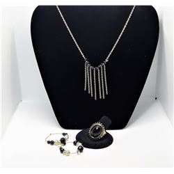 7)  SUITE OF GOLD TONE AND BLACK ONYX