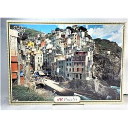 3)  FACTORY SEALED 2000 PCE PUZZLE OF