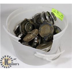 PAIL OF GAS AND RADIATOR CAPS