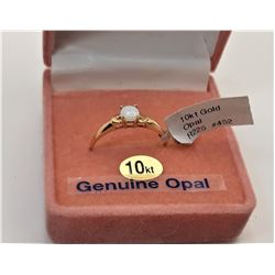 12)  NATURAL ROUND MILK FIRE OPAL RING