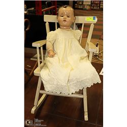 LARGE ANTIQUE BISQUE DOLL AND ROCKER