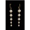 Image 1 : 14kt yellow gold and cultured freshwater pearl drop earrings.