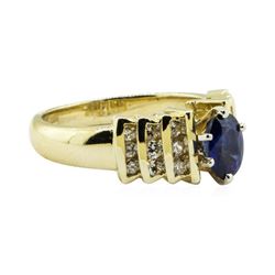 1.30 ctw Oval Brilliant Blue Sapphire And Diamond Ring - 14KT Yellow Gold