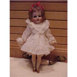 7  Cabinet sized bisque head doll #1031318