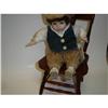 Image 1 : BOY DOLL SITTING IN CHERRY WOOD CHAIR #1076113