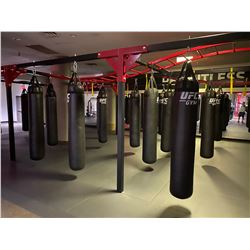 UFC BAG RACK, APPROX. 20' X 60' WITH OVER 30 BAGS, LADDERS AND PADDING