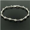Image 4 : 18K White Gold 1.65 ctw Diamond Flower Cluster Twisted Wire Link Tennis Bracelet