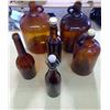 Image 1 : LOT OF BROWN GLASS JUGS