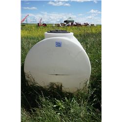 625 gallon white plastic hauling water to sprayer