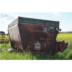 Butler Silage Mixer with a scale (rusted out)
