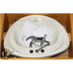 1 SELF RIMMING LAVATORY WITH FAUCETS