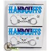 Image 1 : TWO NEW HANDCUFFS WITH KEYS