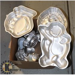 BOX OF ASSORTED WILTON CAKE PANS INCLUDES