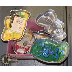 BOX OF ASSORTED WILTON CAKE PANS INCLUDES