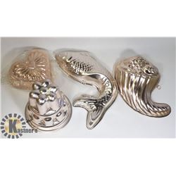 FOUR VINTAGE COPPER COLOURED JELLY MOLDS