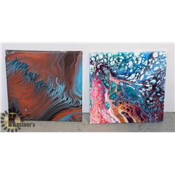 LOT OF TWO STRETCHED CANVAS ART PIECES