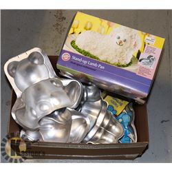 BOX OF ASSORTED WILTON CAKE PANS INCLUDES