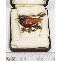 ENAMELED SONG BIRD ON A BRANCH  BROOCH