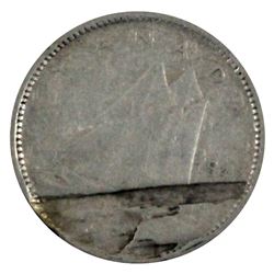 1947 Canada 10-cent with Major Lamination error across reverse. Coin is in VG-F condition, impressiv