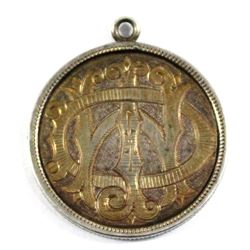 Love Token with Mounted Loop "WDI" & "KOTM" on Either Side.