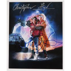 Lot #81 - BACK TO THE FUTURE PART II (1989) - Michael J. Fox and Christopher Lloyd Autographed Photo