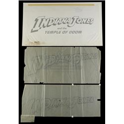 Lot #361 - INDIANA JONES AND THE TEMPLE OF DOOM (1984) - Two Hand-Drawn and One Printed Title Card L