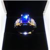 Image 1 : Ladies 6K Tanzanite Stone Ring, Mounted On Gold Tone Band With Inset Semi-Precious Stones