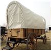 Image 2 : Covered Wagon, 5th wheel gear with 4-wheel hydraulic brakes ans leaf springs, cushions on all benche