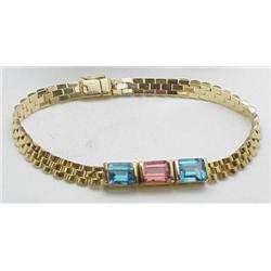 Ladys bracelet blue topaz and pink tou