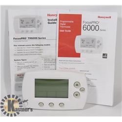 HONEYWELL FOCUSPRO TH6110D THERMOSTAT WITH MANUALS