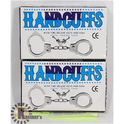 TWO HANDCUFFS WITH KEYS